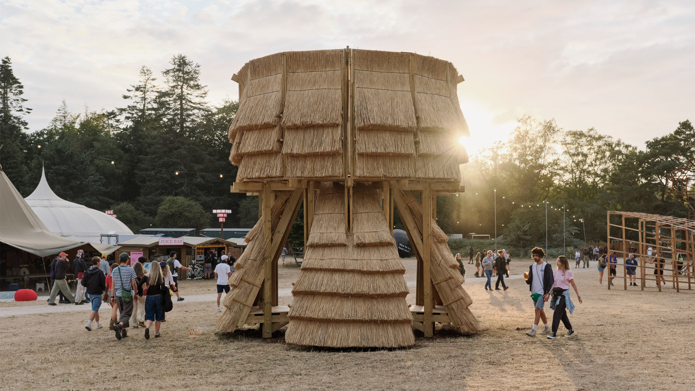 A thatched tower at Houghton, built from reed the RSPB was cutting anyway, image via Dezeen